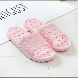 New pink rubber bathroom slippers